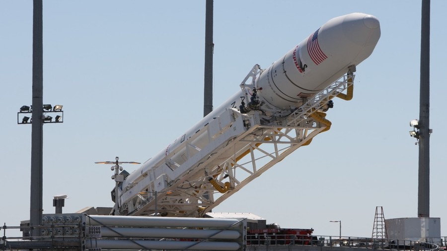 AmericaSpace-image-of-Orbital-Science-Corporation-Antares-rocket-being-raised-into-position-at-NASA-Wallops-Virginia-Photo-Credit-Mark-Usciak-with-AmericaSpace