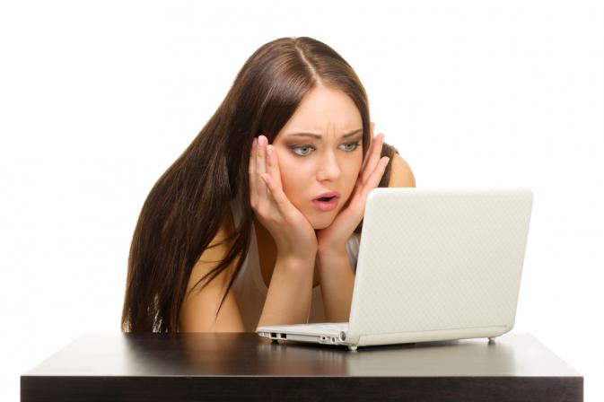 woman sad computer