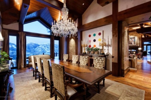 the-dining-room-is-equipped-with-a-chandelier-that-would-impress-any-dinner-guest-and-seating-for-eight