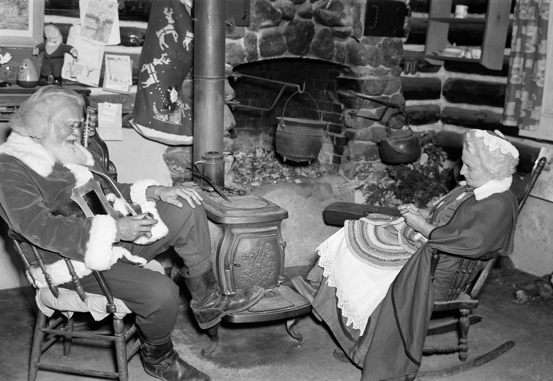  People Dressed as Santa and Mrs. Claus 