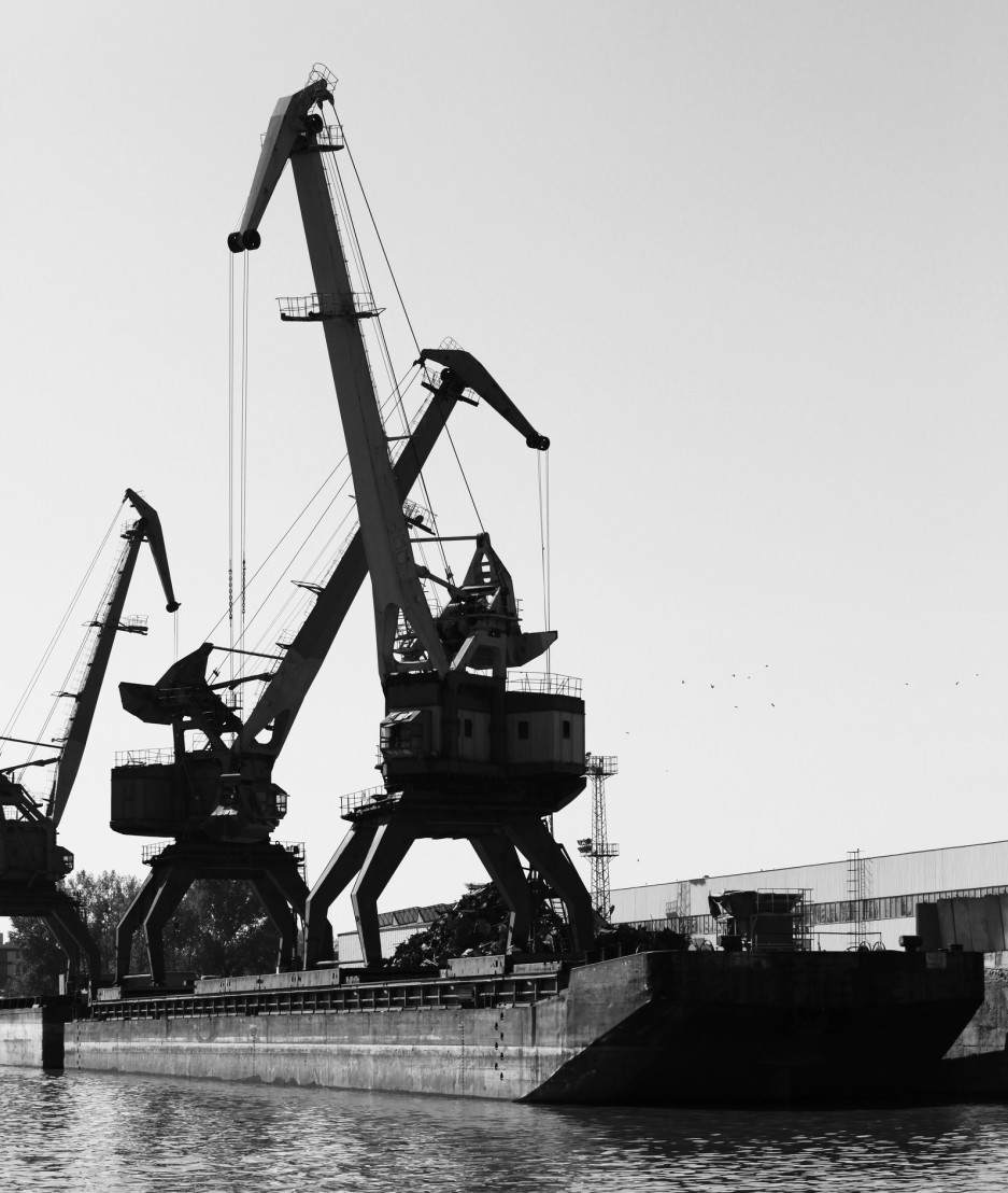  Dark silhouettes of industrial port cranes, Danube River 