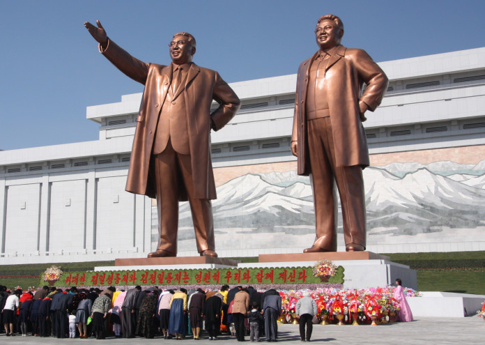  The_statues_of_Kim_Il_Sung_and_Kim_Jong_Il_on_Mansu_Hill_in_Pyongyang_(april_2012) 
