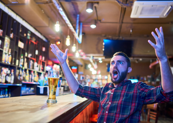  Emotional Sports Fan in Pub 
