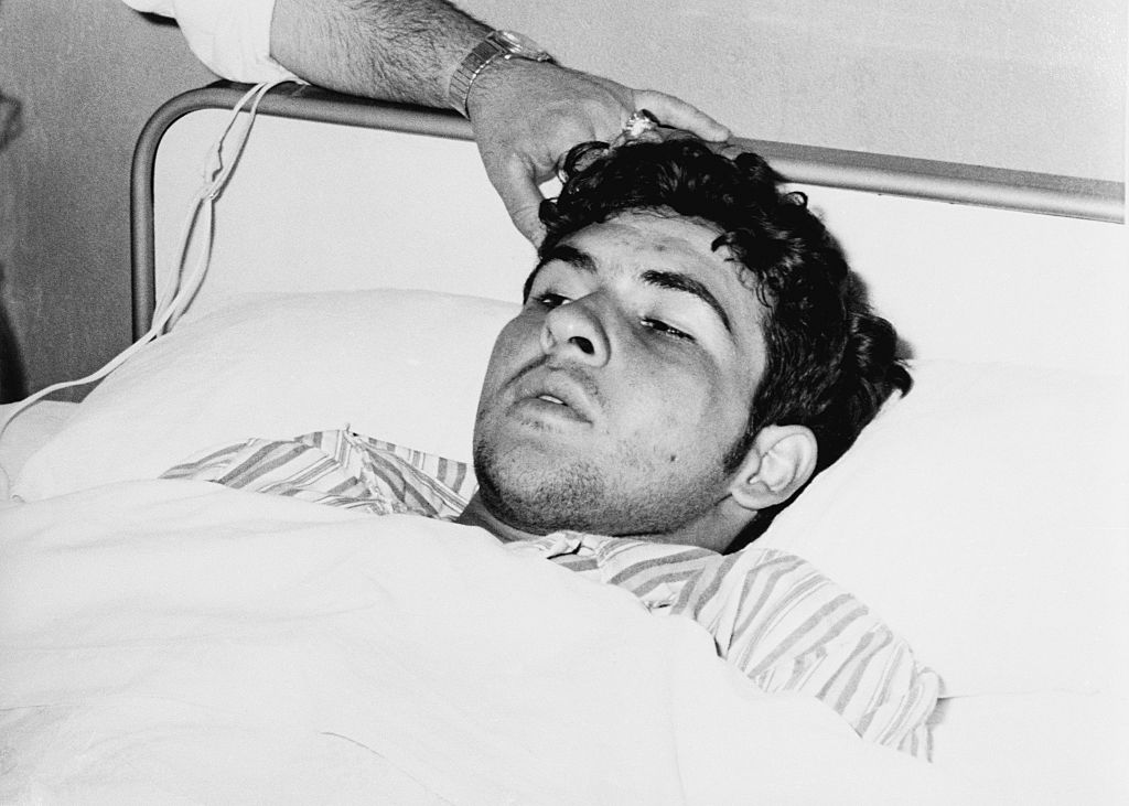  Man Lying in a Hospital Bed 