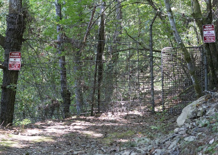  1200px-Bohemian_Grove_Secret_Side_Entrance_ 